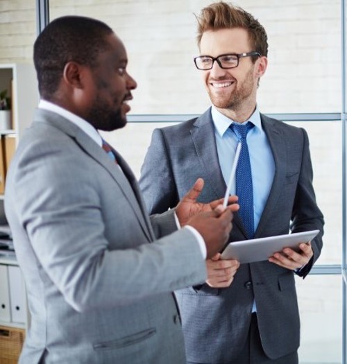 Men Talking In Office