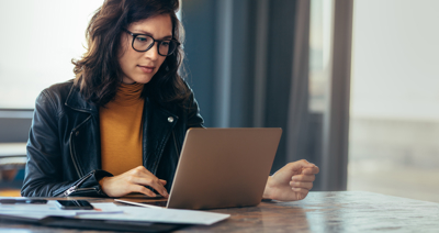 Woman looking at a laptop