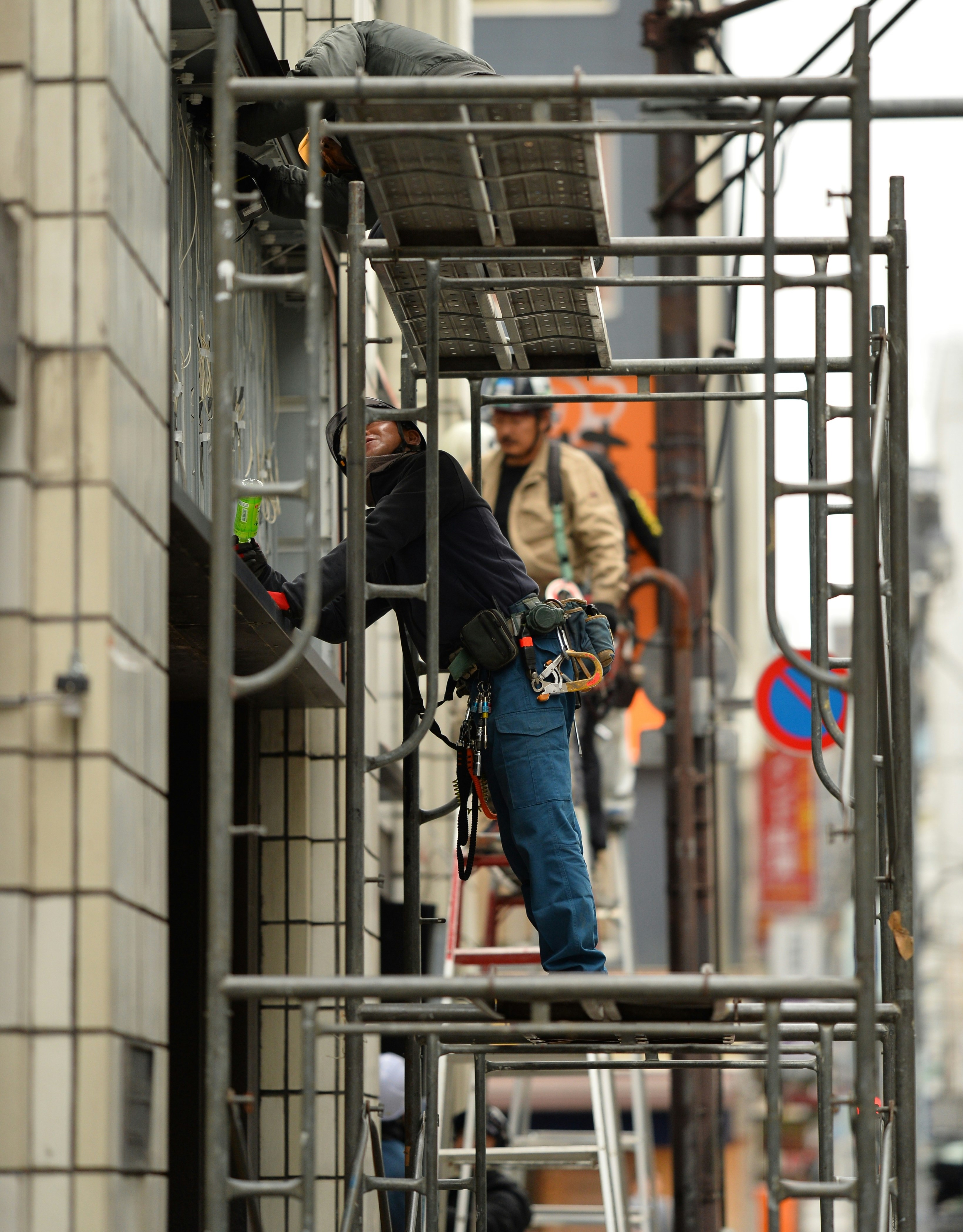 Men working on scaffolding